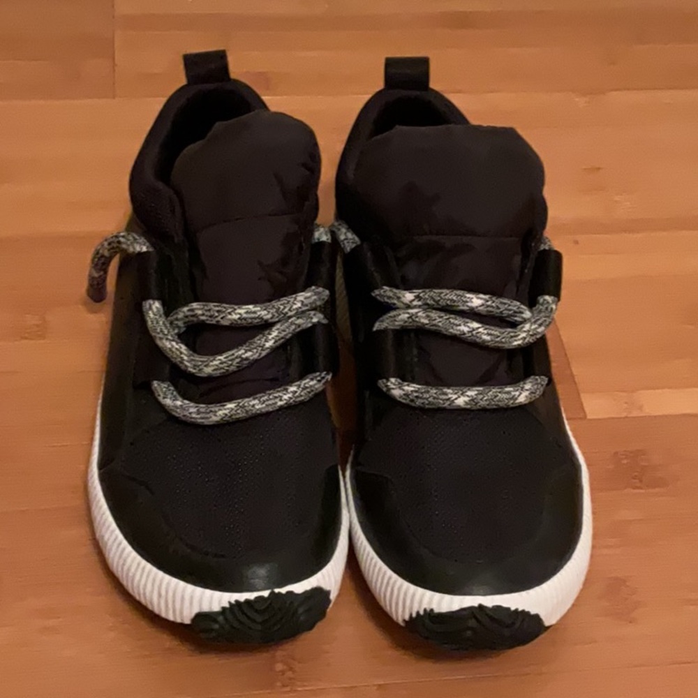 Sorel Black and White Sneakers Sleek Slip-On Comfort